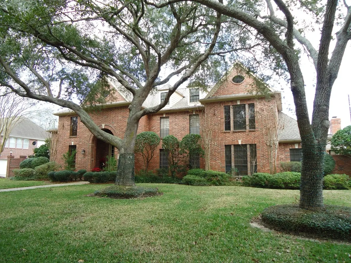 Houston home with bronze replacement windows
