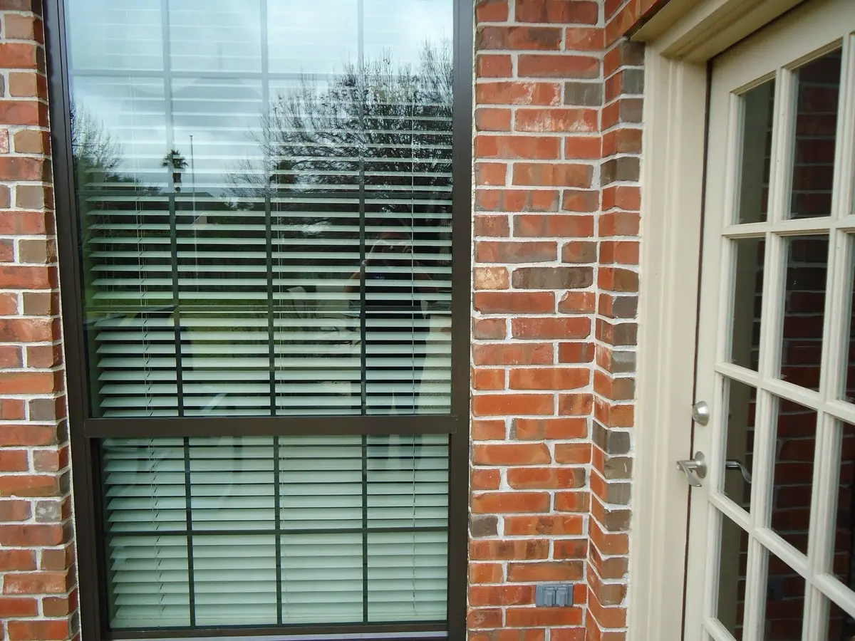 Exterior detail of bronze replacement windows