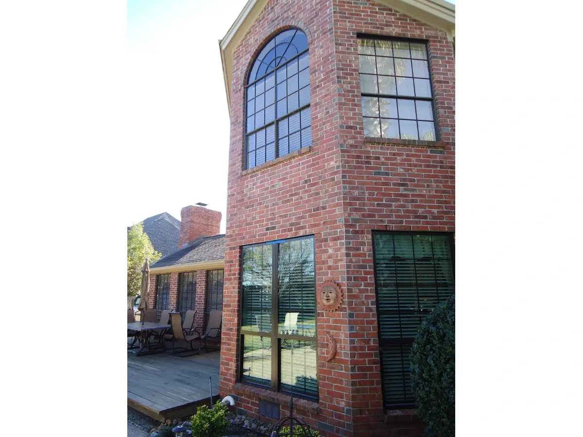 Finished bronze window replacement detail